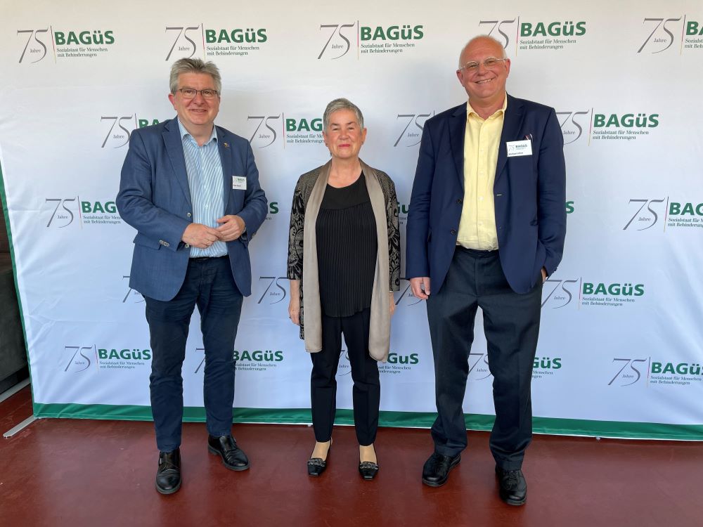 Bild: Peter Renzel, Dr. Irme Stetter-Karp und Michael Löher vor der Fotowand der BagüS